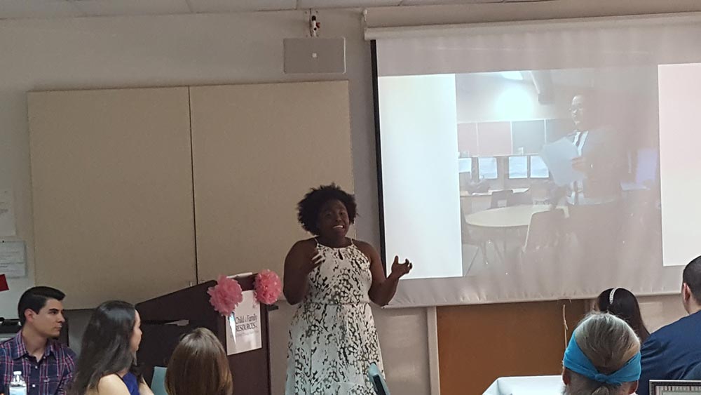 A lady giving presentation