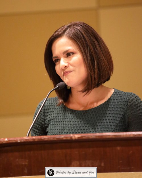 Women speaking on a mic