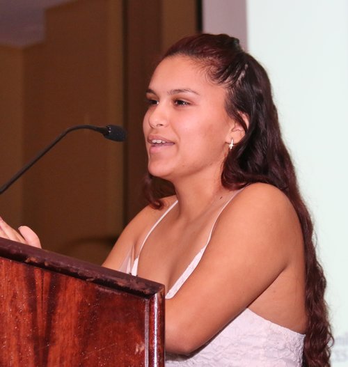 Women speaking on a mic