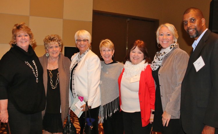 Six women and one man group picture