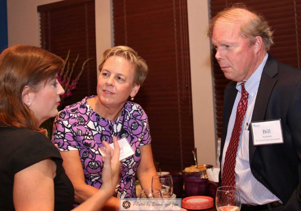 Three people talking with each other