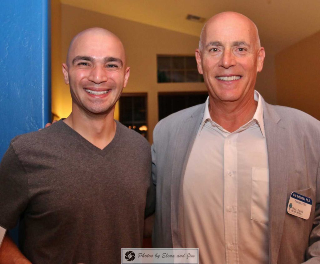 Two happy bald man