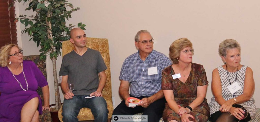 Five people seating on chair