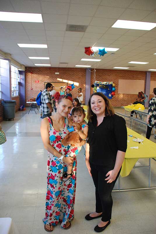 Women and a Mother holding a little daughter