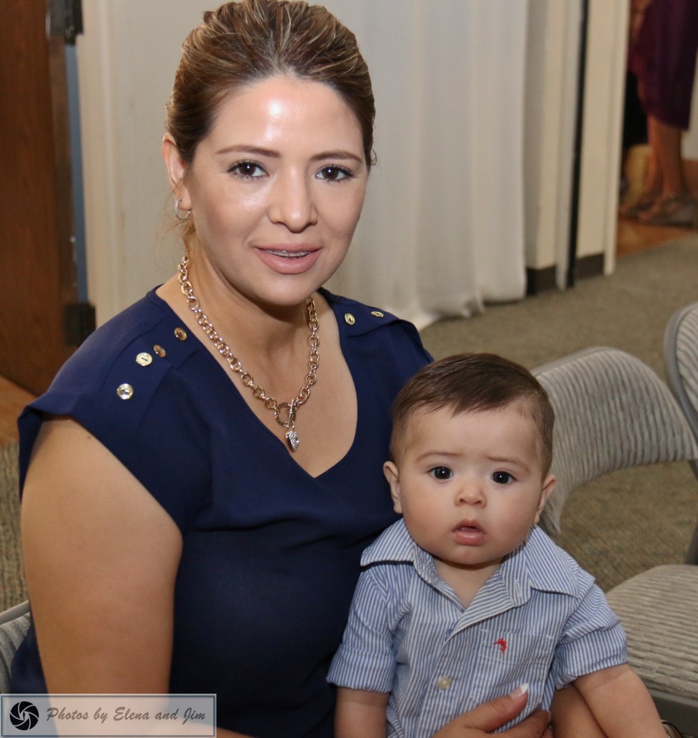 A lady sitting with her son