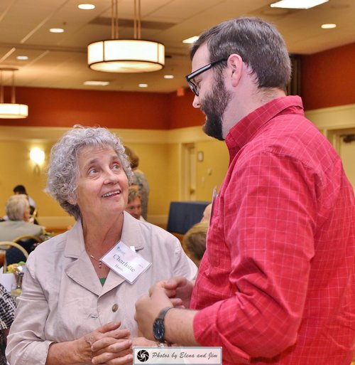 Elder women and man smiling