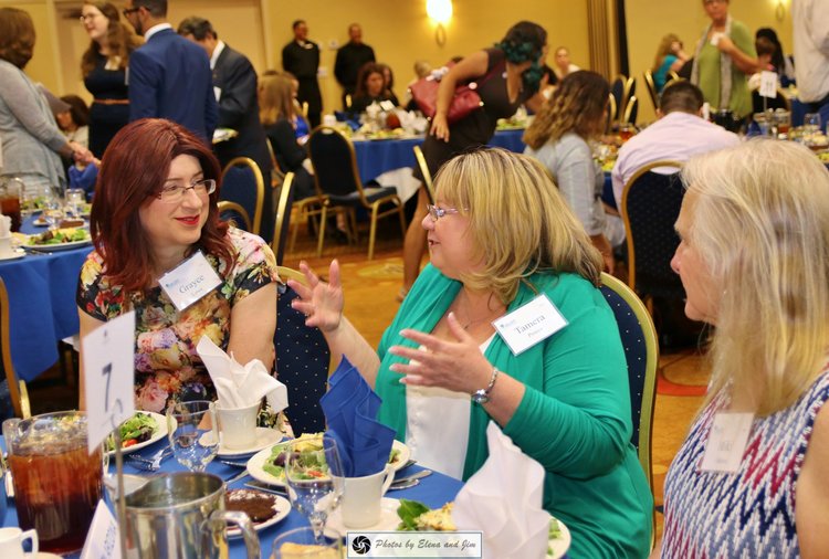 Group of peoples on dinning table at party