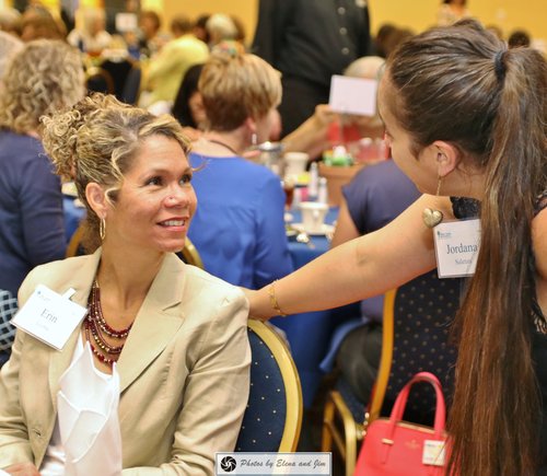 two women talking with each other