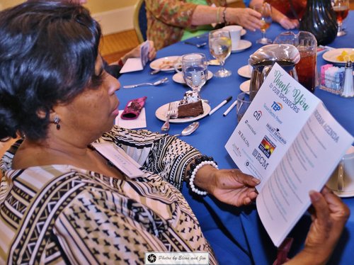 Women reading thank you letter