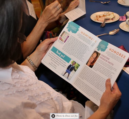 Women reading thank you letter