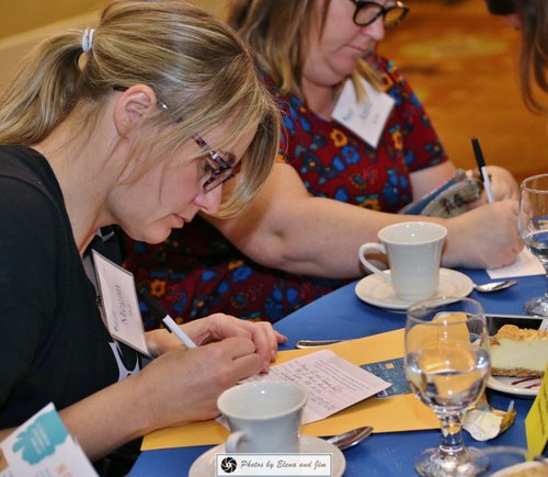 Women writing on a paper