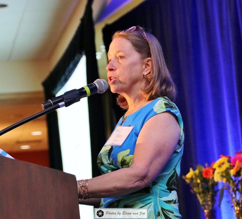 Women speaking on a mic