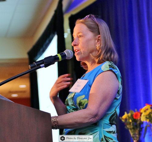 Women speaking on a mic