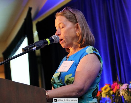 Women speaking on a mic