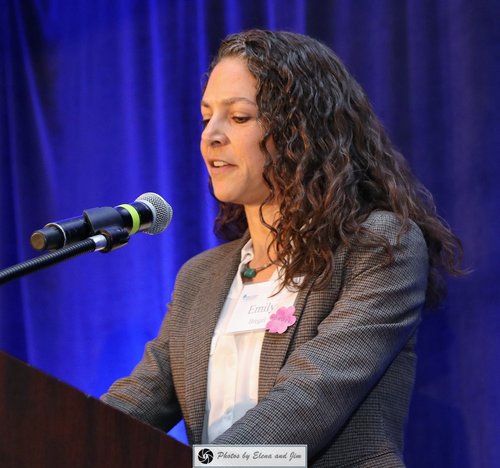 Women speaking on a mic