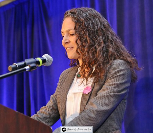 Women speaking on a mic