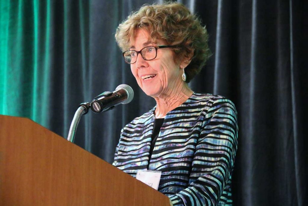 Women speaking on mic