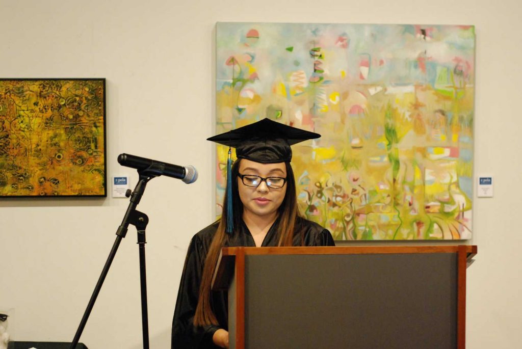 Women speaking on mic