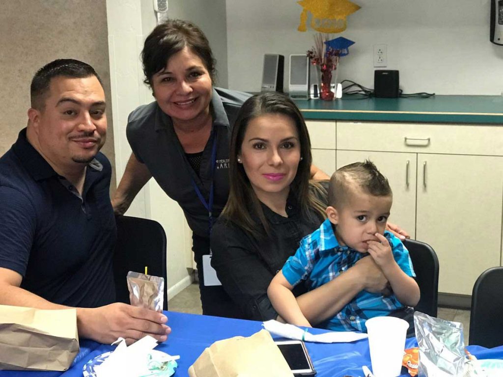 Parents and teacher on summer celebration