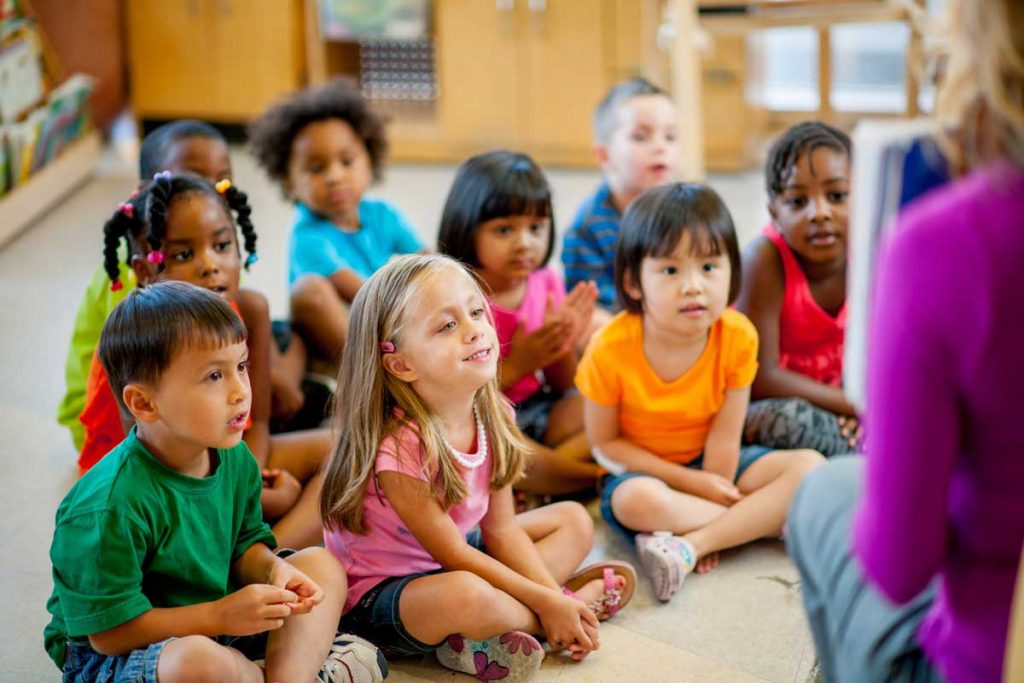 Teacher with little children's