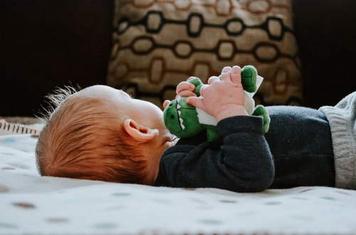 Little baby sleeping on bed