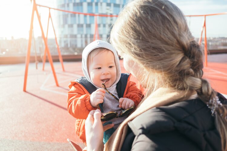 Rosa playing with her child