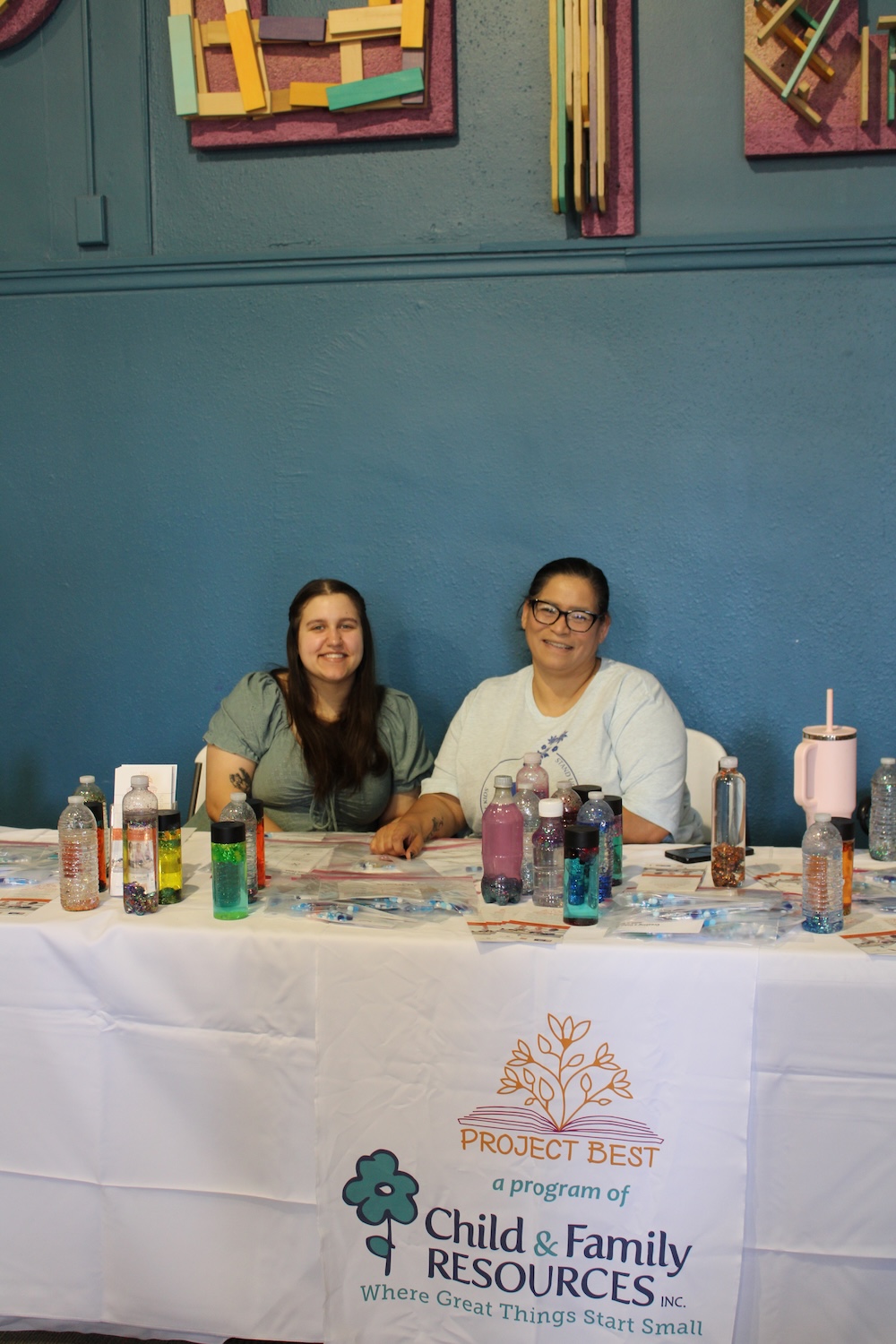 Two staff from Project Best table at the 2025 Program Round Up