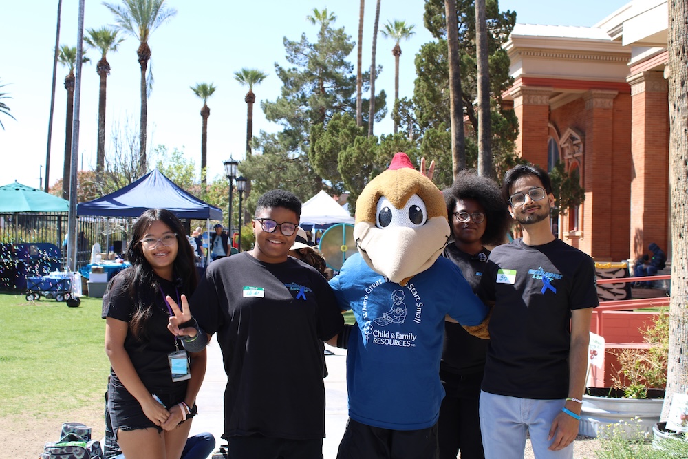 Youth leaders and mascot at outdoor Child & Family Resources 2025 Program Round Up