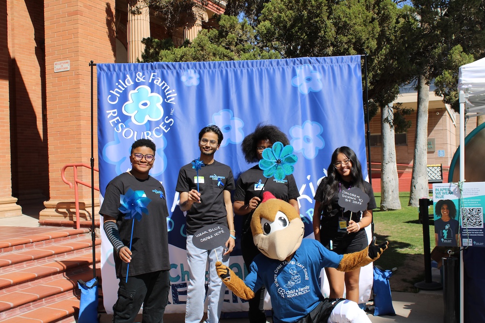 Youth leaders and mascot at outdoor Child & Family Resources 2025 Program Round Up