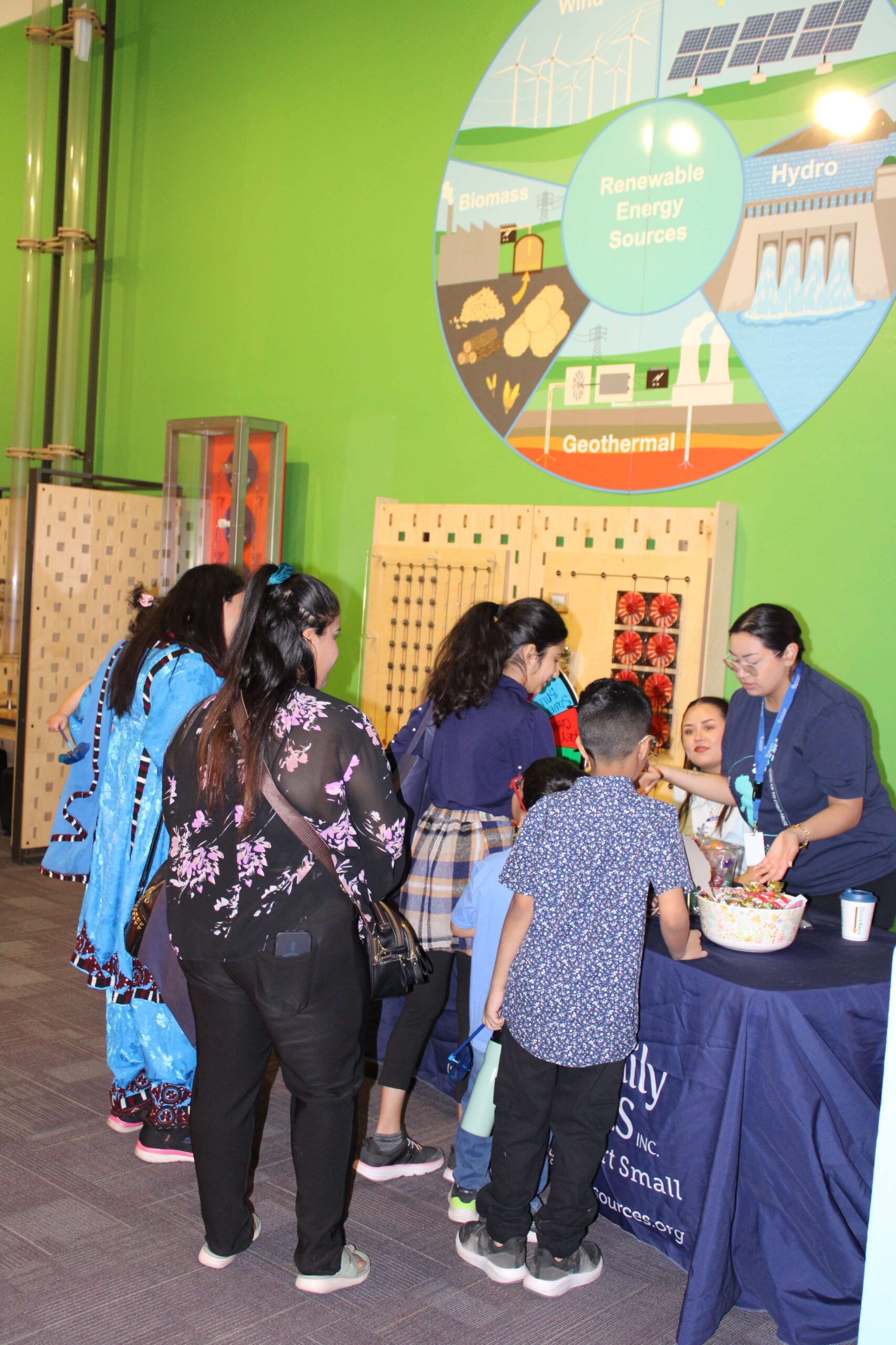 Volunteers at a resource booth
